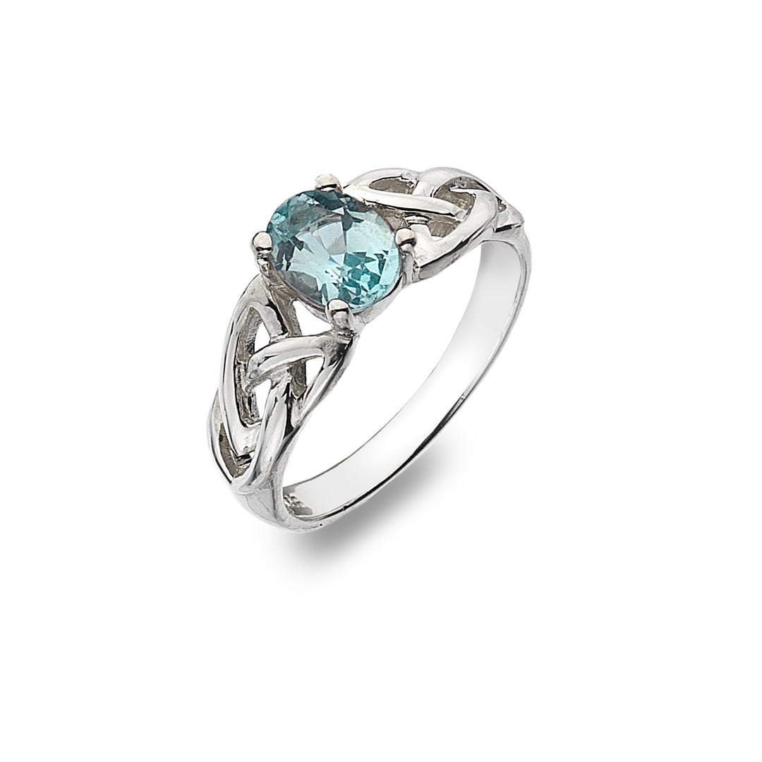 Sterling Silver Blue Topaz Ring with Trinity Knot Detail